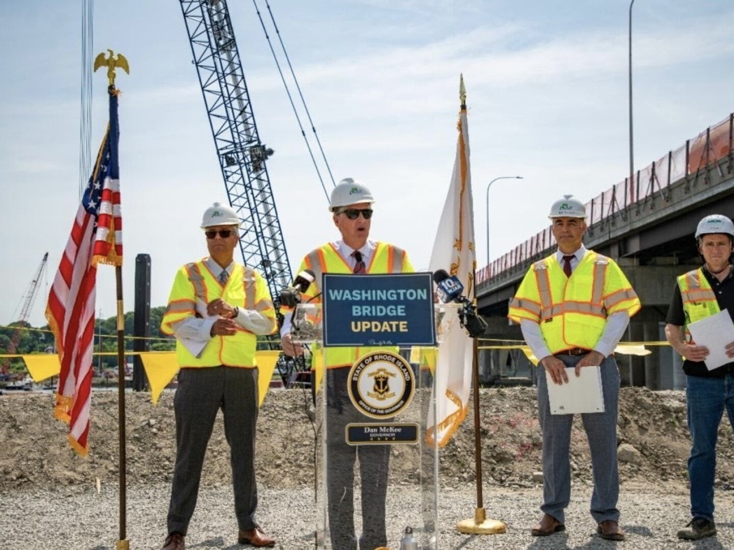 Gov. Dan McKee speaks at a press event this week marking the start of in-water construction on the Washington Bridge replacement project. The new western span is not expected to be completed until late 2028, keeping the bridge’s closure, traffic backups and political fallout front and center heading into the 2026 election.