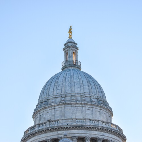 Sunshine illuminates the Independent Man statue atop the Rhode Island State House on Jan. 7, 2025.