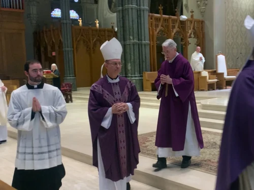 Pope Francis has named Bishop Bruce Lewandowski, center, the new Bishop of Providence.