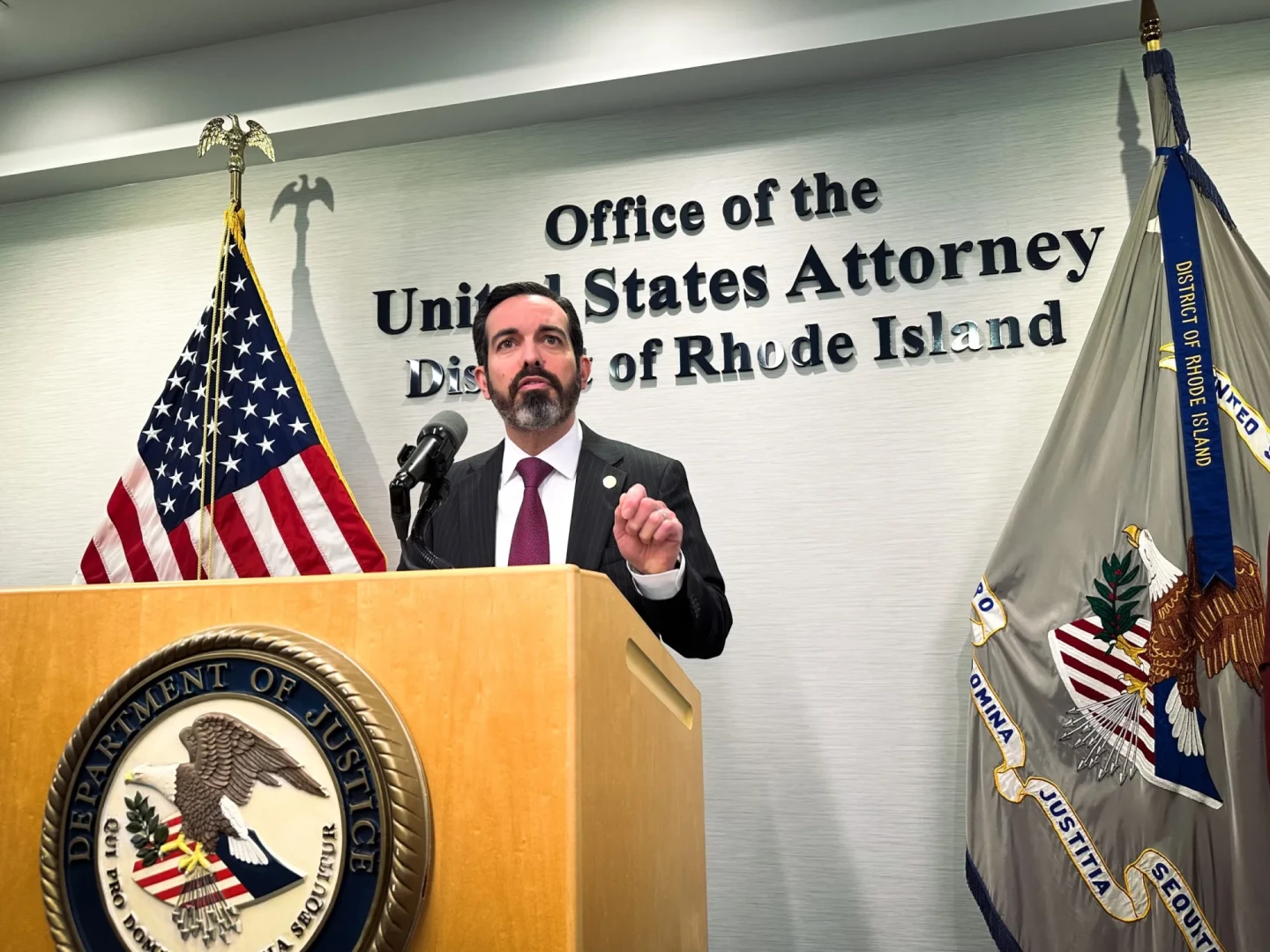 U.S. Attorney Zachary Cunha announces a proposed settlement to a lawsuit alleging the ‘warehousing’ of kids in psychiatric care.