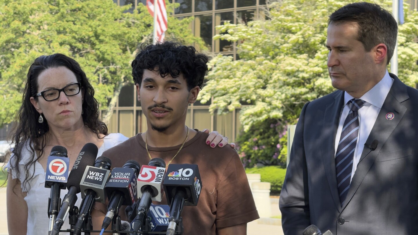 Marcelo Gomes da Silva, 18, center, a Massachusetts high school student who came to the U.S. from Brazil at age 7 and was detained by U.S. Immigration and Customs Enforcement agents Saturday, May 31, 2025, speaks to journalists after being released from detention on bond as Rep. Seth Moulton, D-Mass., right, listens, Thursday, June 5, in Burlington, Mass.