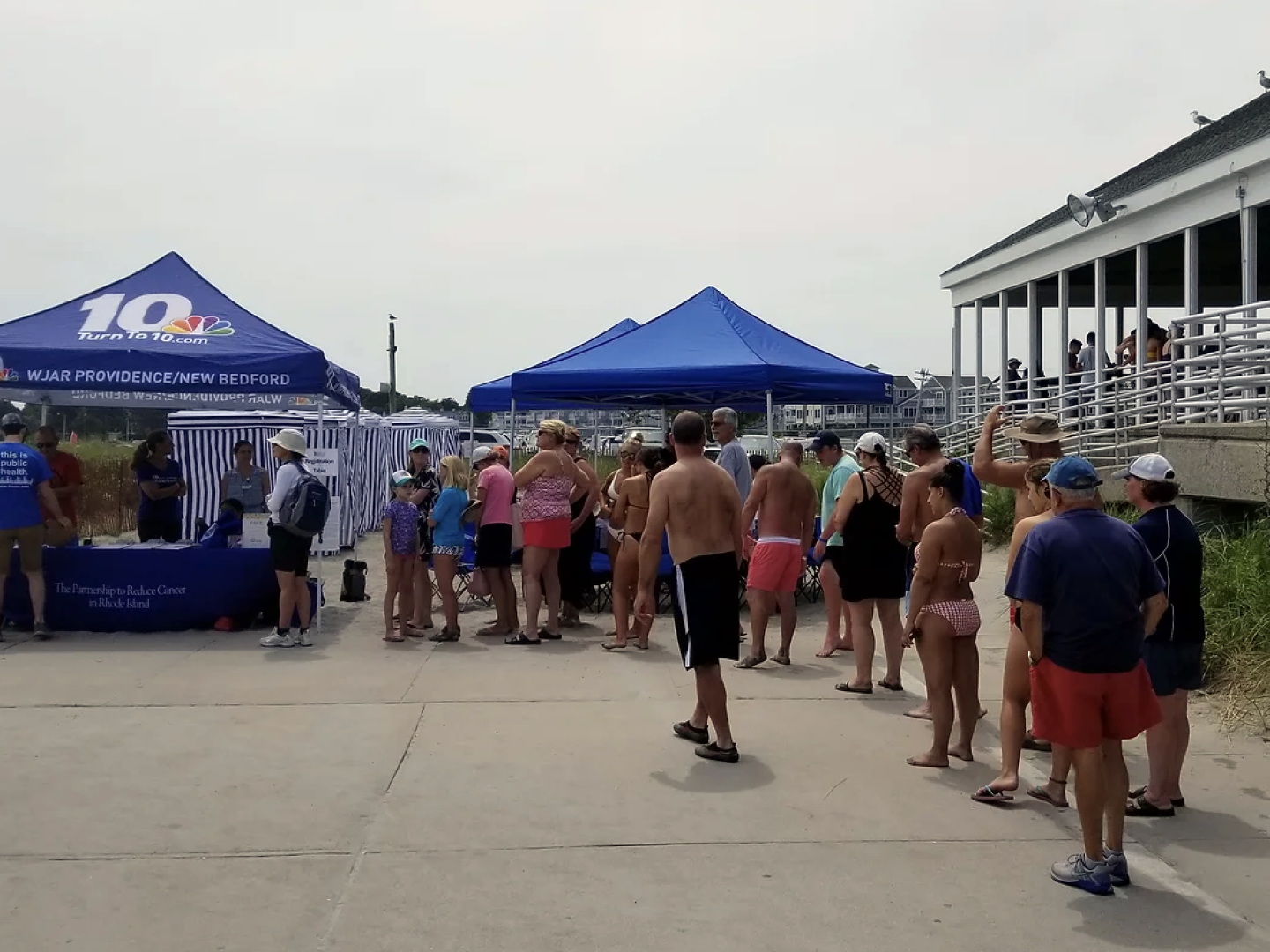 Beachgoers line up for a free skin cancer screening in this file photo.