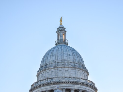 Sunshine illuminates the Independent Man statue atop the Rhode Island State House on Jan. 7, 2025.