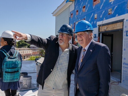 Real estate developer Lee Peyser shows Rhode Island Gov. Dan McKee construction at Dexter Street Commons in Pawtucket.