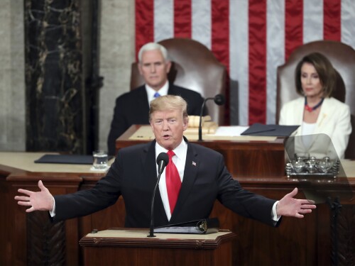 FILE - President Donald Trump delivers his State of the Union address to a joint session of Congress on Capitol Hill in Washington, as Vice President Mike Pence and Speaker of the House Nancy Pelosi, D-Calif., watch, Feb. 5, 2019.