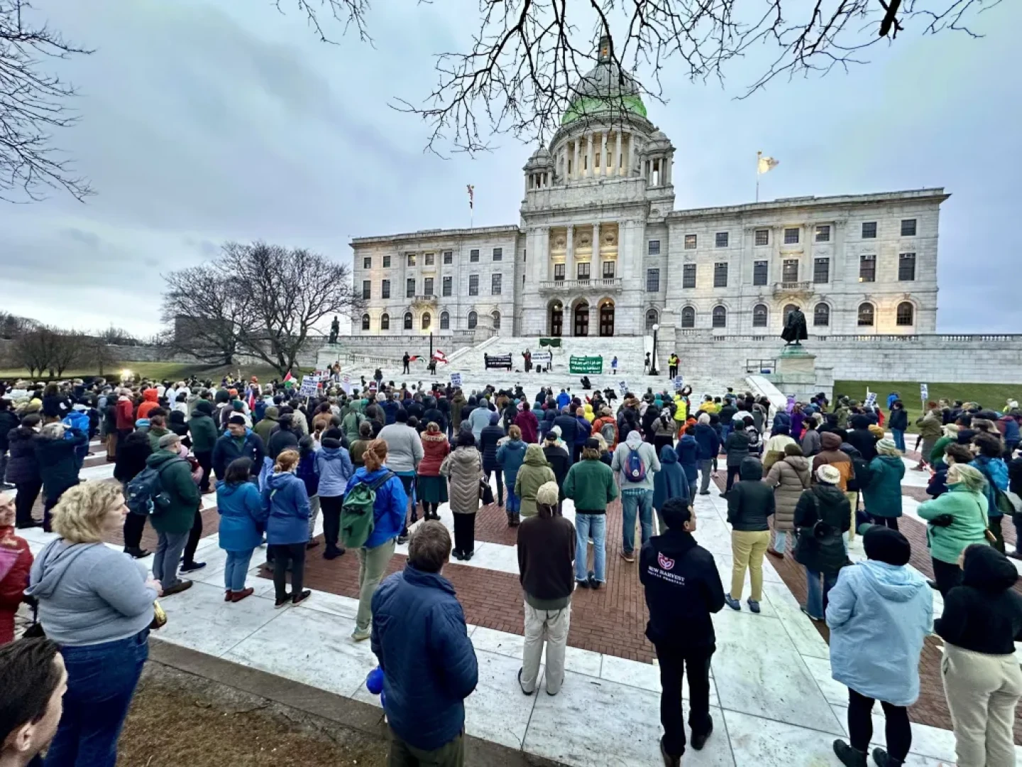 Crowds turned out at the Statehouse Monday night to protest the deportation of a Rhode Island Kidney doctor detained at Logan Airport last week.