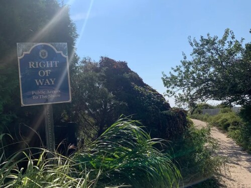 A newly elevated right-of-way sign protected with plastic glass is shown at Everett Avenue in Westerly.