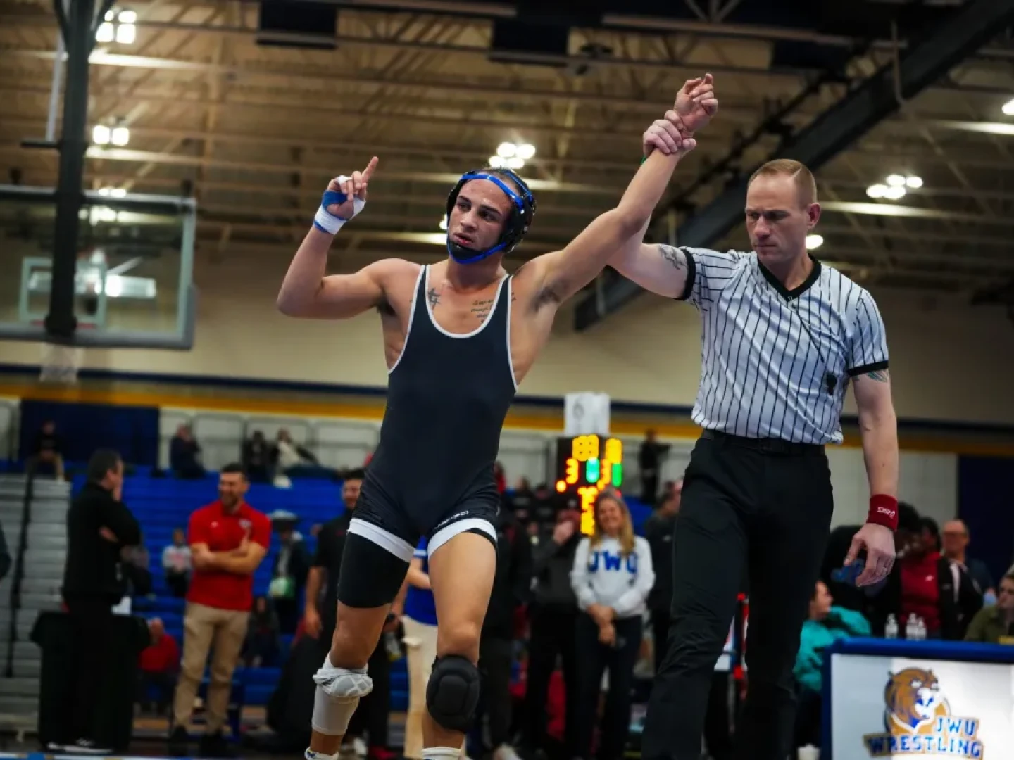 JWU's Joziah Fry hopes to have his hand raised in triumph Saturday night.