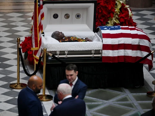 Former Hartford Mayor Thirman L. Milner lies in state at City Hall on December 12, 2024. Incumbent Mayor Arunan Arulampalam greets city officials and other visitors who came to pay their respects in the morning.