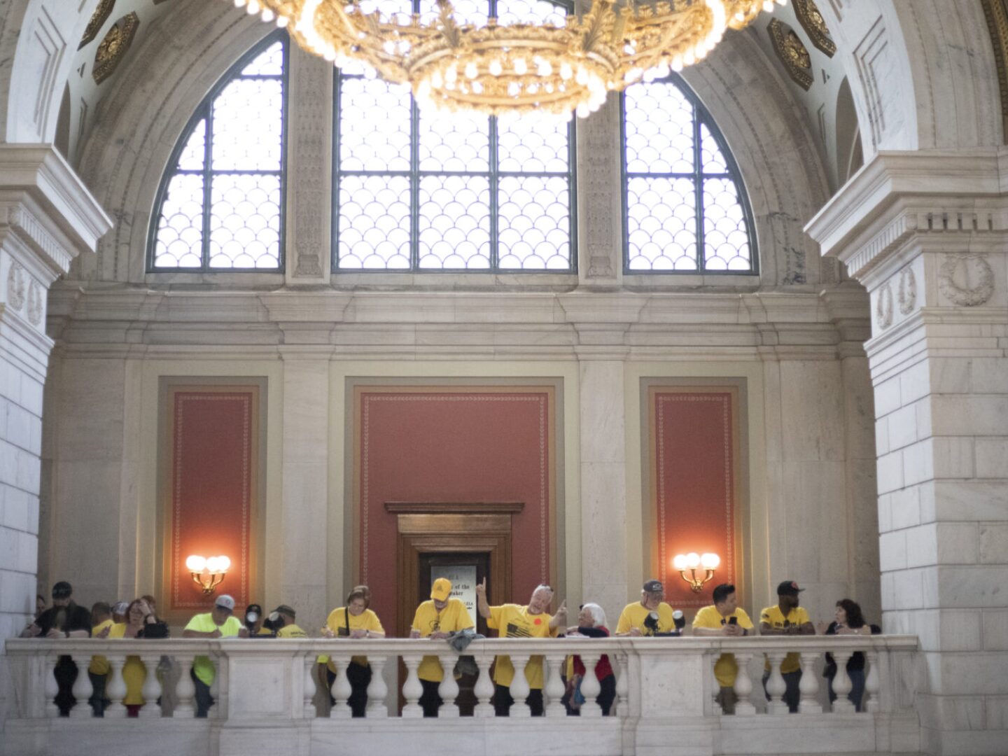 Second Amendment supporters sign up and wait to testify on a bill that would regulate semiautomatic weapons in Rhode Island ahead of a hearing by the Senate’s Committee on Judiciary on May 14, 2025.