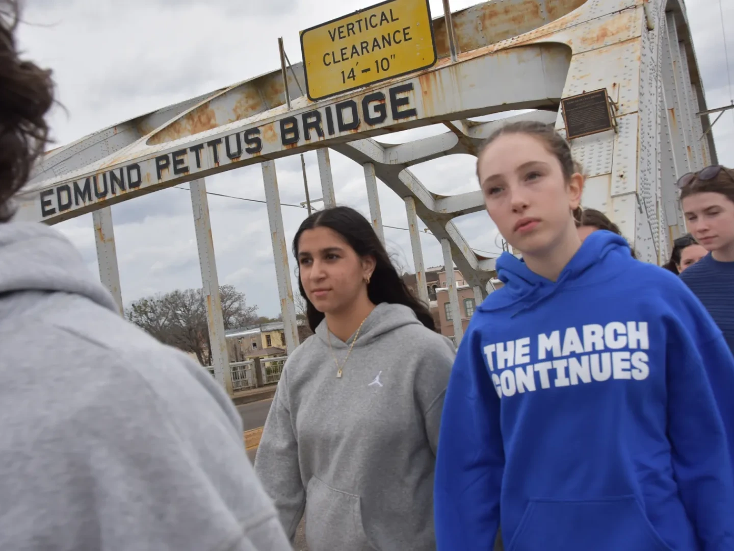 Miriam Mohamed (center left) and her classmates crossed the Edmund Pettus Bridge in Selma, Alabama, in March 2025. The bridge was the launch point of the 1965 Voting Rights March and site of the violent Bloody Sunday confrontation with police a few days earlier.