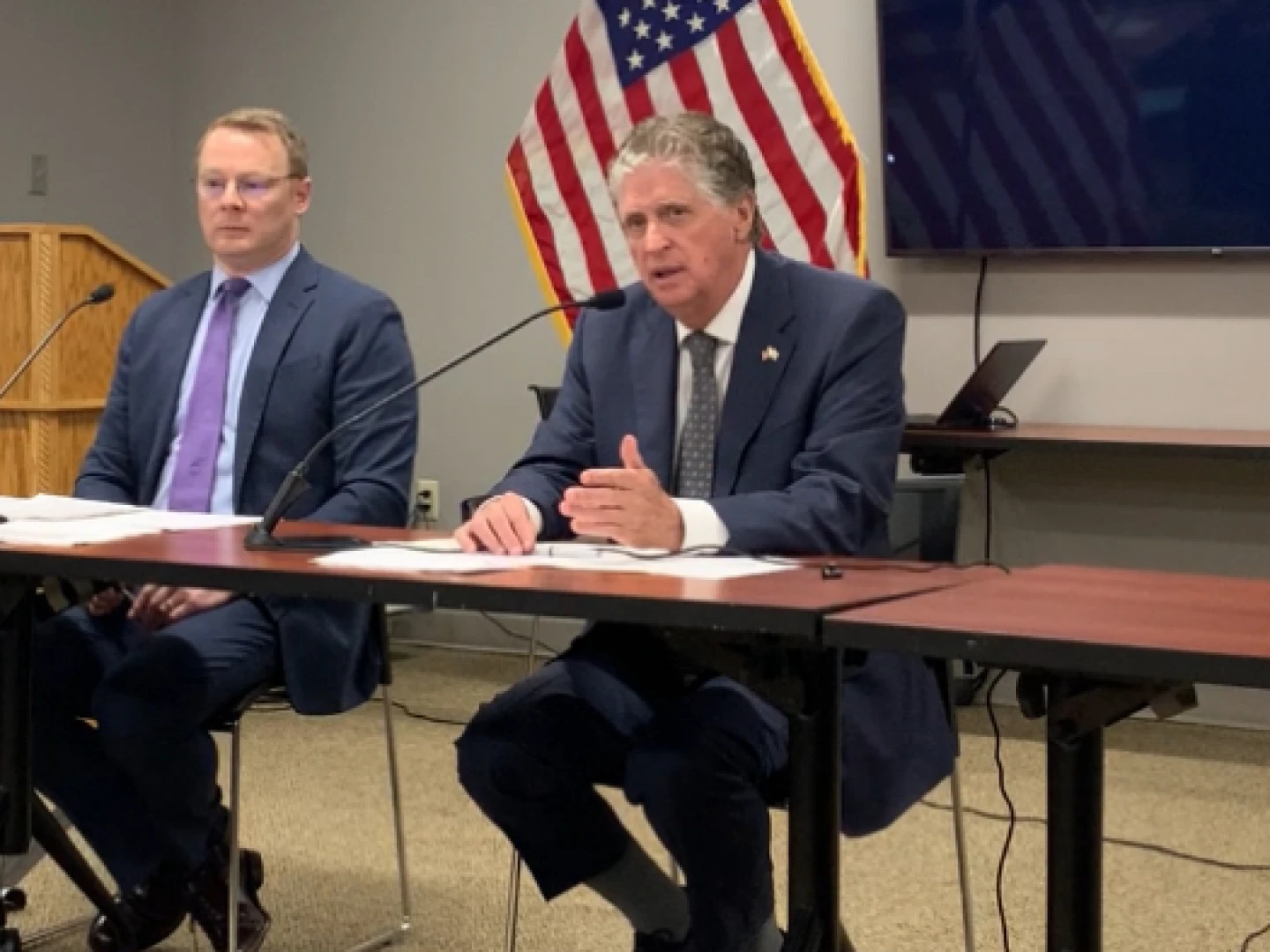 Brian Daniels, Director of the governor's Office of Management and Budget, and Rhode Island Gov. Daniel McKee at a press briefing Wednesday, June 25, 2025.