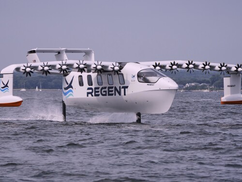 The REGENT Viceroy Seaglider, a winged passenger ferry, glides over the surface of Narragansett Bay on a test run, Wednesday, Aug. 6, 2025, off the coast of North Kingstown, R.I.