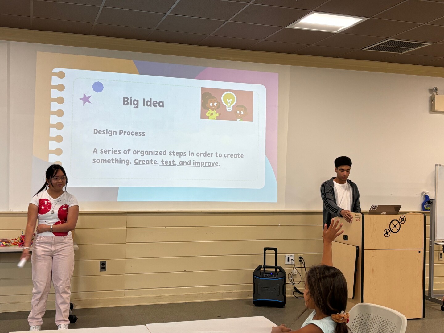 Rhode Island PBS and The Public's Radio interns Julia Rose Palad and George Siri are seen here facilitating the last session of LEAP into the Loop at Warwick Public Library.