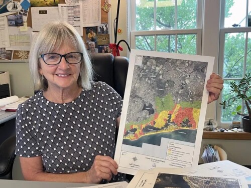 Charlestown Town Planner Jane Weidman displays a map of development around the town’s salt ponds.