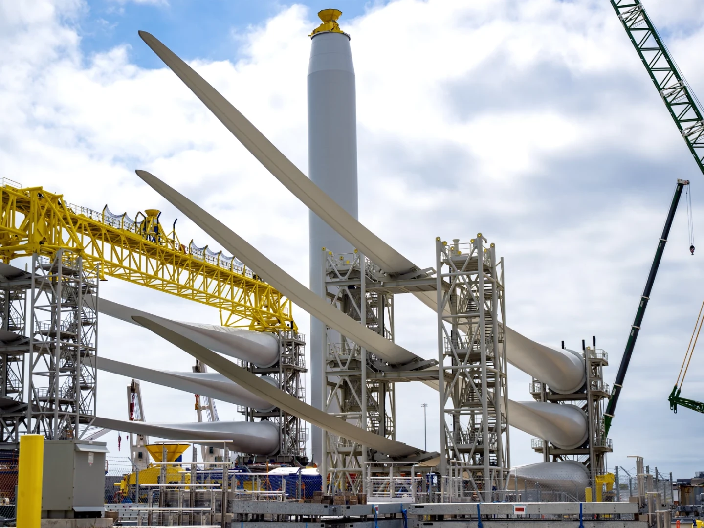 FILE: Workers and officials gather at the State Pier in New London on August 25, 2025 to discuss the Trump administration’s order to halt construction on Revolution Wind, an offshore wind project that has been in constructions since 2023 and is already 80% completed.