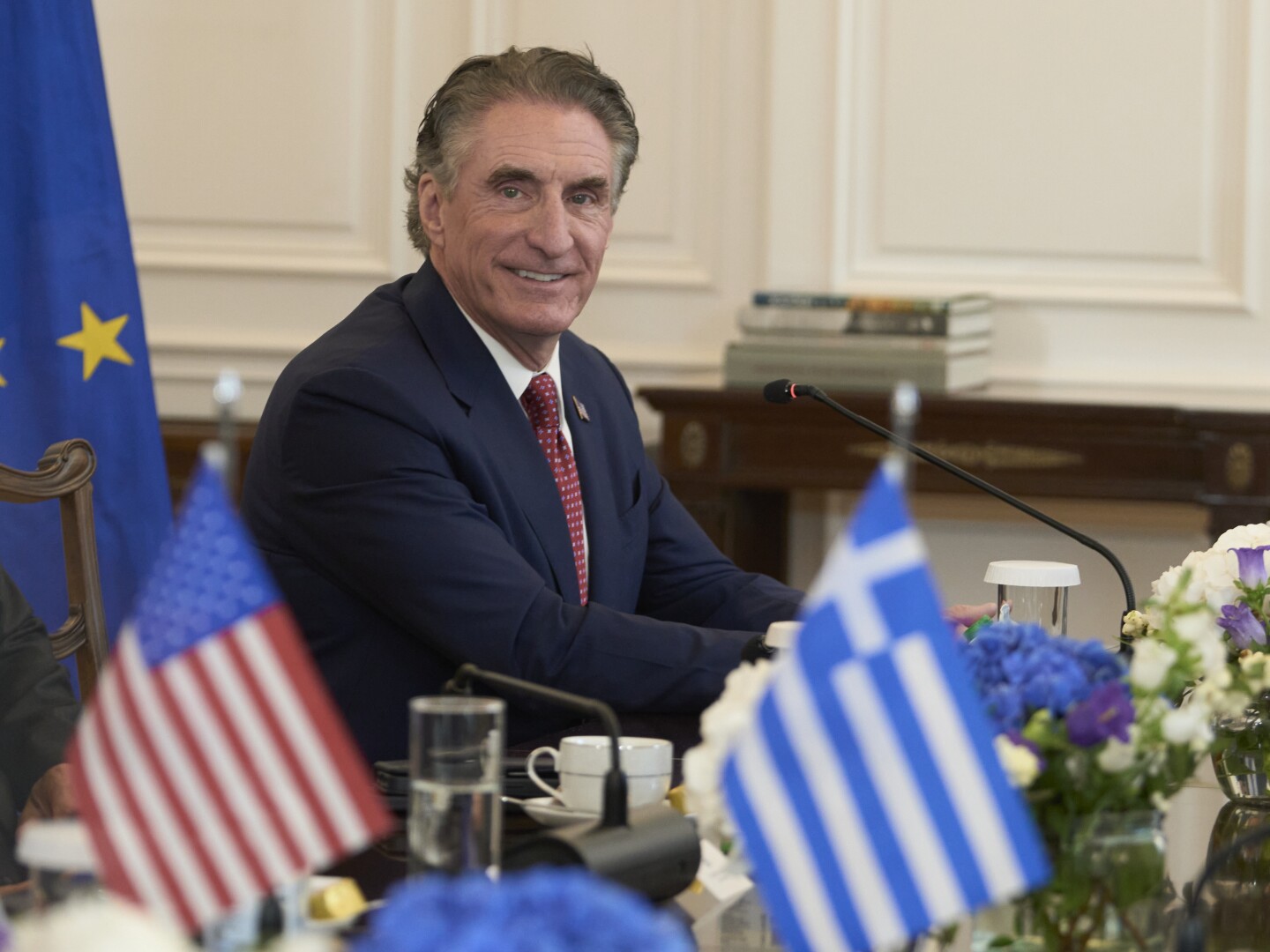 U.S. Secretary of the Interior Doug Burgum looks on during a meeting with Greek Prime Minister Kyriakos Mitsotakis at the Maximou Mansion in Athens, Thursday, Sept. 11, 2025