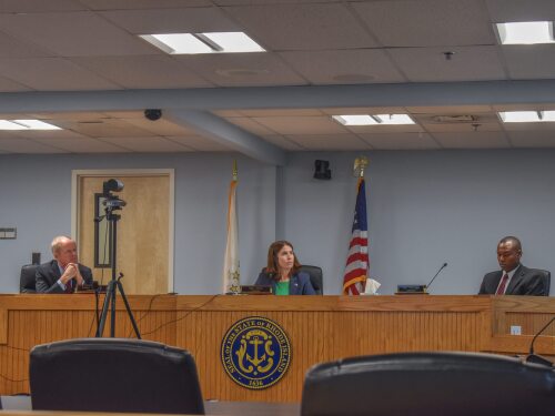 Cannabis Control Commissioners seen during the panel’s monthly meeting on Monday, Oct. 20, 2025. Left to right are Robert Jacquard, Chairperson Kimberly Ahern and Layi Oduyingbo.