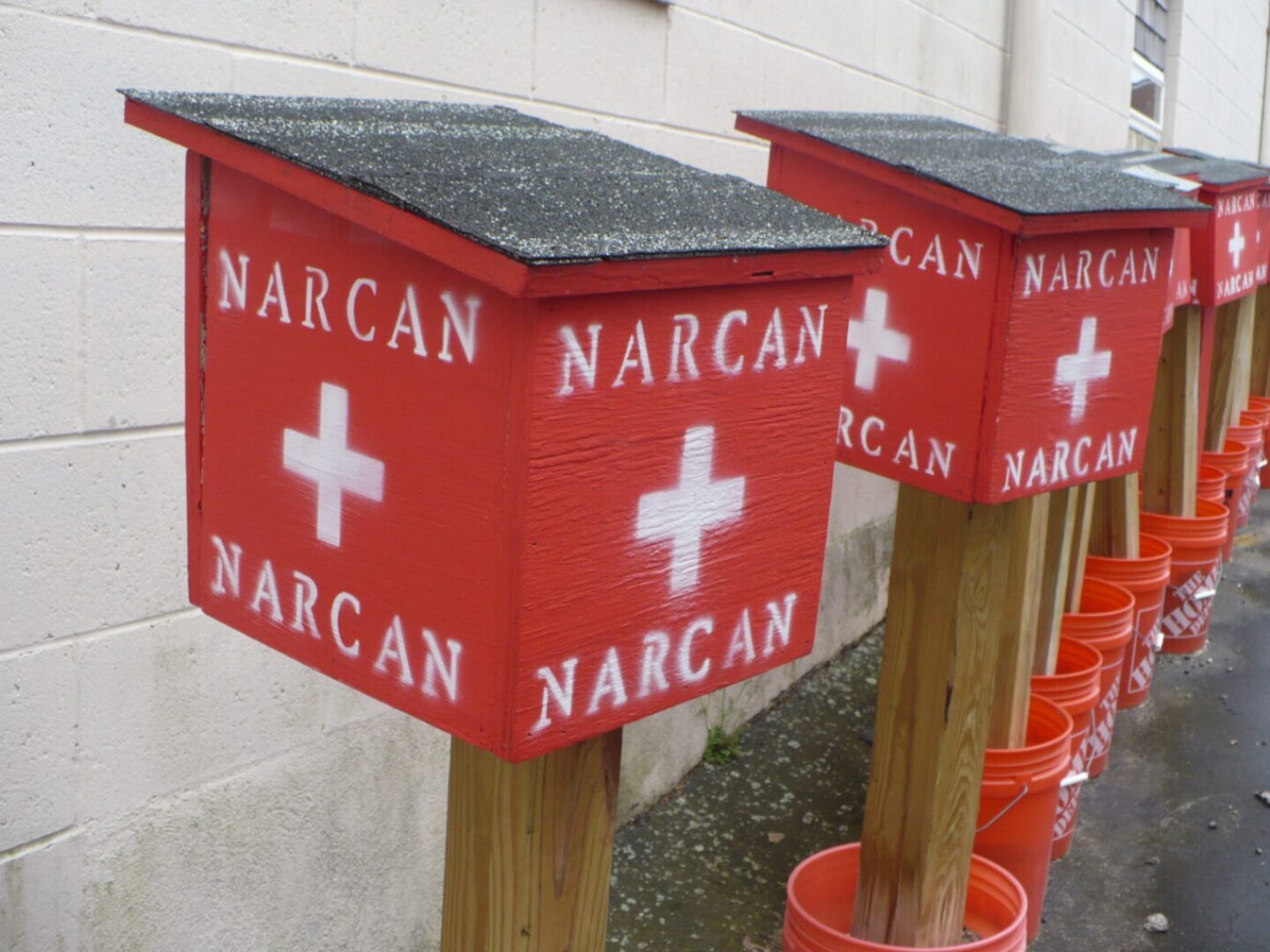 Publicly-accessible Boxes containing Naloxone, an opioid reversal drug also known by the brand name Narcan, line up outside the East Bay Recovery Center in Warren.