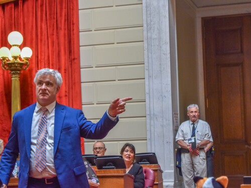 Rep. Jason Knight, a Barrington Democrat, defends his bill to ban assault-style weapons during debate on the House floor on June 5, 2025.