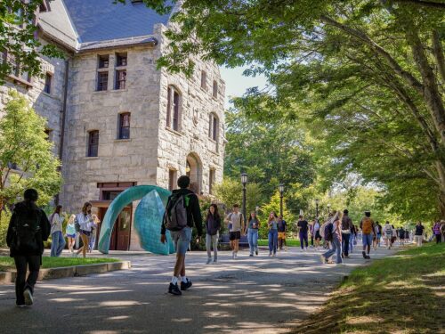 Students walk past Lippitt Hall on the University of Rhode Island’s Kingston campus.