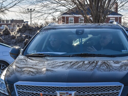 Democratic State Rep. Enrique Sanchez of Providence, left, is seen in the passenger seat of his attorney’s Cadillac following his initial appearance before the Rhode Island Traffic Tribunal on Feb. 19, 2025. Sanchez is being represented by Rep. John Lombardi, a Providence Democrat.