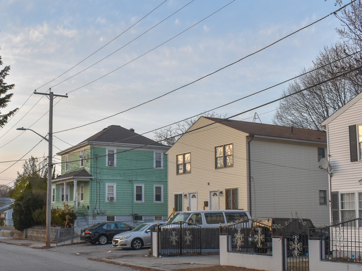 A street in Providence’s Silver Lake neighborhood is shown in March. A minimum-wage worker would need to work 85 hours a week to afford a basic two-bedroom apartment in Rhode Island, according to a new report.