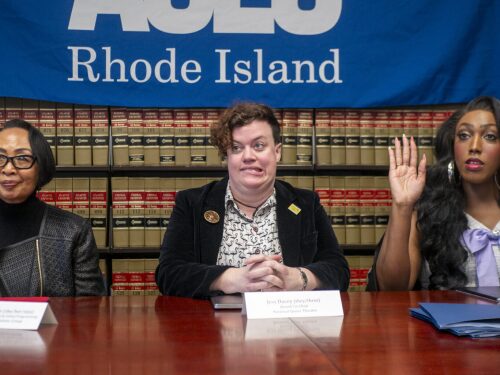 Left to right, Emilya Cachapero of Theatre Communications Group, Jess Ducey of National Queer Theater, and Giselle Byrd of The Theater Offensive react to a question at a March 6, 2025, press conference about challenges facing queer and LGBTQ+ performing arts groups under new federal grant requirements. All three are plaintiffs in a suit against the National Endowment for the Arts filed with the help of the Rhode Island chapter of the American Civil Liberties Union. The fourth plaintiff is Rhode Island Latino Arts.
