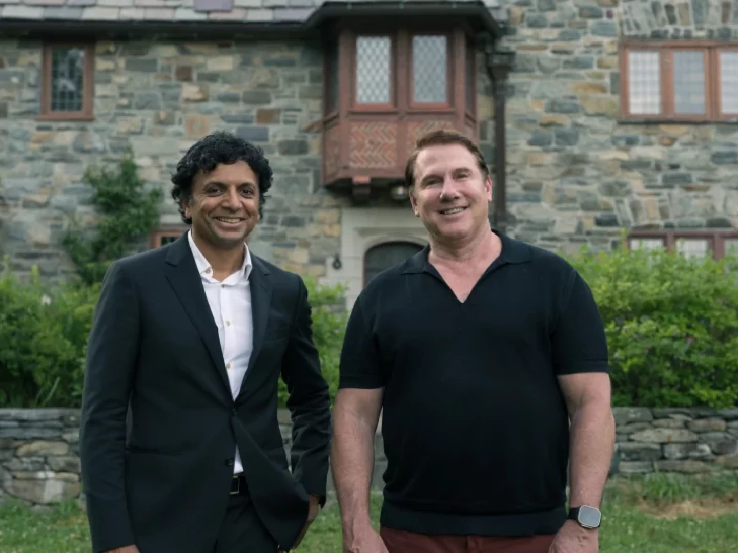 Shyamalan, left, and Sparks, right, almost collaborated in the late 1990s on adapting Sparks' The Notebook. Nearly three decades later, they've joined forces for the first time on the book and film project Remain.