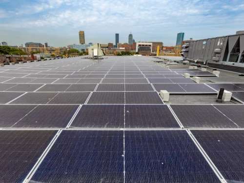 The solar array on the rooftop of a Boston Medical Center building provides power for the building as well as credits for the Clean Power Prescription program.