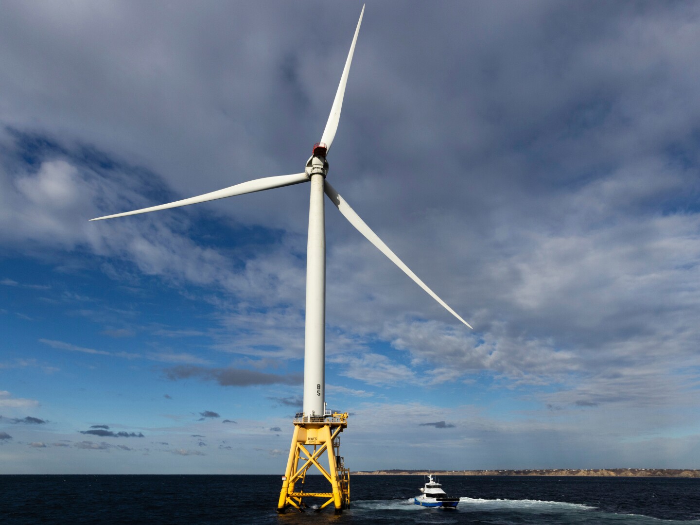 FILE - A Block Island Wind Farm turbine operates, Dec. 7, 2023, off the coast of Block Island, R.I., during a tour organized by Orsted. (AP Photo/Julia Nikhinson, File)